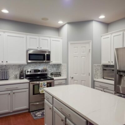 New Kitchen Quartz Countertops and Marble Tile Backsplash